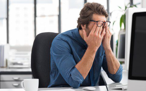 Man stressed at work